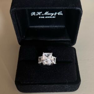 Costume jewelry silver CZ three stone emerald cut ring